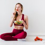 diet concept with sport woman healthy food